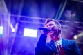 Low-angle shot of the singer Richard Paul Astley performing at the Silverstone Classic