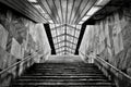 Low angle shot of a staircase of a building with a skylight roofing in grayscale Royalty Free Stock Photo