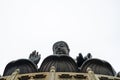 Low angle shot of the statue of Tian Tan Buddha in Lantau, Hong Kong under a clear sky