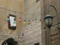 Low angle shot of a string of colorful decorative light bulbs in the street, Cairo, Egypt