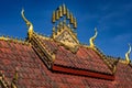 Low-angle shot of a temple roof design in Wat Phiawat, Xiangkhouang, Laos