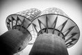 Low angle shot of two identical  abstract buildings on clear sky background Royalty Free Stock Photo