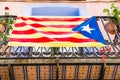 Low angle shot from under a balcony in Estelada, the Catalan independentist flag, Girona, Spain