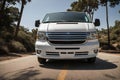 low-angle shot of the van from front, emphasizing the front bumper, grille, and headlight Royalty Free Stock Photo