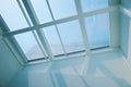 Low-angle shot of a white rooftop window of a house Royalty Free Stock Photo