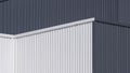 Gray and white corrugated metal factory building wall in perspective view Royalty Free Stock Photo