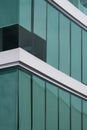 Green roller blinds inside of modern glass office building Royalty Free Stock Photo