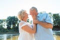 Romantic senior couple enjoying a healthy and active lifestyle outdoors