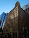 Low-angle vertical of The Grace Sydney building a clear sky background