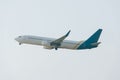 Low angle view of aeroplane with cloudy sky