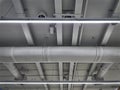 Air Conditioning Ducts and Piping with Illumination on the Ceiling