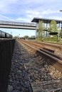 Low angle view along the platform and over the train track Hoorn Netherlands Royalty Free Stock Photo