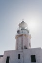 Low angle view of Armenistis Lighthouse in Mykonos, Greece