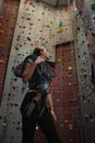 Low angle view of athlete looking up while standing in gym Royalty Free Stock Photo