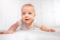 Low angle view of baby boy toddler learn to crawl