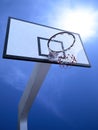 Low angle view of basketball hoop against blue sky Royalty Free Stock Photo