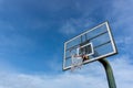 Low angle view of basketball ring on sky background. Outdoor basketball hoop Royalty Free Stock Photo