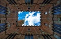 Low-angle view of the city center of Siena, Italy, capturing the grand architecture of the area
