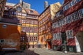 low angle view of beautiful historical houses against blue sky and cozy empty yard