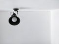 Black modern wall lamp on white cement wall with ceiling in home office room