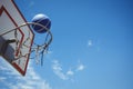 Low angle view of blue basketball in hoop Royalty Free Stock Photo