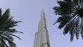 Low angle view of Burj Khalifa in Dubai, UAE. Action. The tallest building in the world and famous tourist attraction Royalty Free Stock Photo