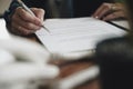 Low angle view of businesswoman proofreading a document Royalty Free Stock Photo