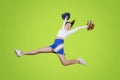 Low angle view of a cheerleader performs on studio Royalty Free Stock Photo