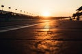 Low angle view chicane on race track at sunset. Generative AI Royalty Free Stock Photo