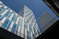 A low angle view of city blue sky scrapers