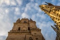 Low angle view of the clock tower of Salamanca's gothic Cathedral with cloudy sky Royalty Free Stock Photo