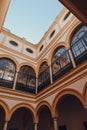 Low angle view of the colourful courtyard of the Hiring House of Indies in Alcazar of Seville, Spain