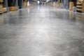 Low angle view of concrete floor in large warehouse store. interior for background. business logistic distribution storage cargo
