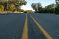 Low Angle View of Country Road With Traffic Sign on the Right Royalty Free Stock Photo