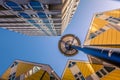 Low angle view of the Cube houses Kubuswoningen and Blaaktoren Het Potlood architecture, both designed by architect Piet Blom