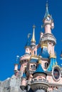 Low-angle view of Disneyland Paris' main castle on a sunny day