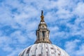 Low angle view of the Dome of St Paul Cathedral in London against blue sky Royalty Free Stock Photo