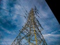 Low angle view of electricity pylon against sky Royalty Free Stock Photo