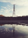 Low angle view of electricity pylon against sky during sunset Royalty Free Stock Photo