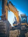 Low angle view of excavator at construction site Royalty Free Stock Photo