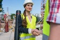 Architect and engineer or supervisor shaking hands on the construction site Royalty Free Stock Photo