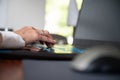 Female hand typing on laptop computer Royalty Free Stock Photo