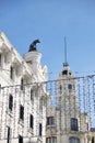 Low angle view of the former Hotel Rome with the iconic bronze sculpture of the Capitoline Wolf on the rooftop Royalty Free Stock Photo