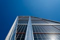 Low angle view of The Gate of Europe towers against blue sky