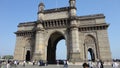 Low angle view of Gateway of India against blue sky Royalty Free Stock Photo