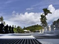 Low angle view of giant checkered plastic mat with Black and White big Chess figures for playing on the ground board, chess pieces Royalty Free Stock Photo