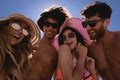 Happy group of friends having fun at beach in the sunshine Royalty Free Stock Photo