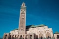 low angle view of Hassan II mosque against sky - travel destination - famous landmark Royalty Free Stock Photo