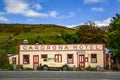Low angle view of the iconic Cardrona Hotel facade, with the historic car in the front of it, Cardrona, South Island, New Zealand Royalty Free Stock Photo
