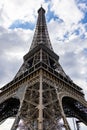 Low-angle view of the iconic Eiffel Tower in Paris, France.